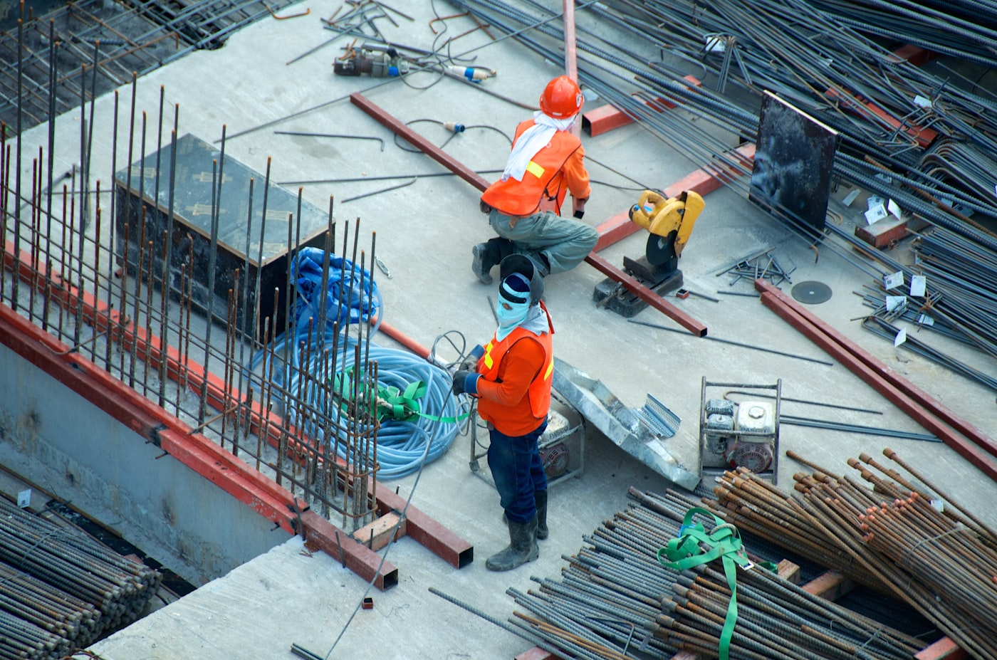 Public works crew on a concrete job site with tools and materials